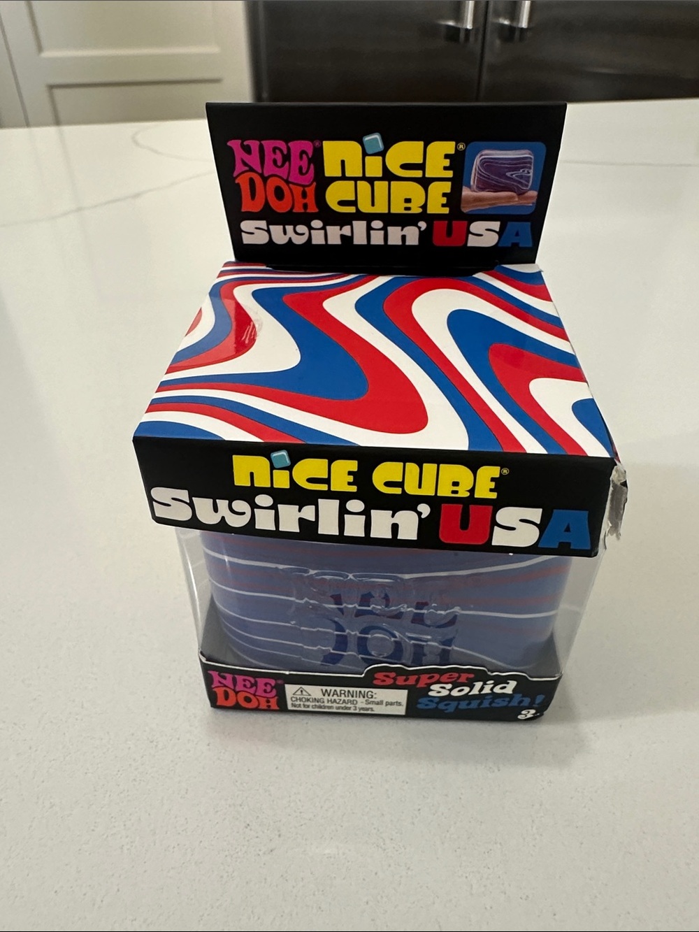 NeeDoh Nice Cube Swirlin' USA Blue-Red Squishy Toy - slightly flawed box New